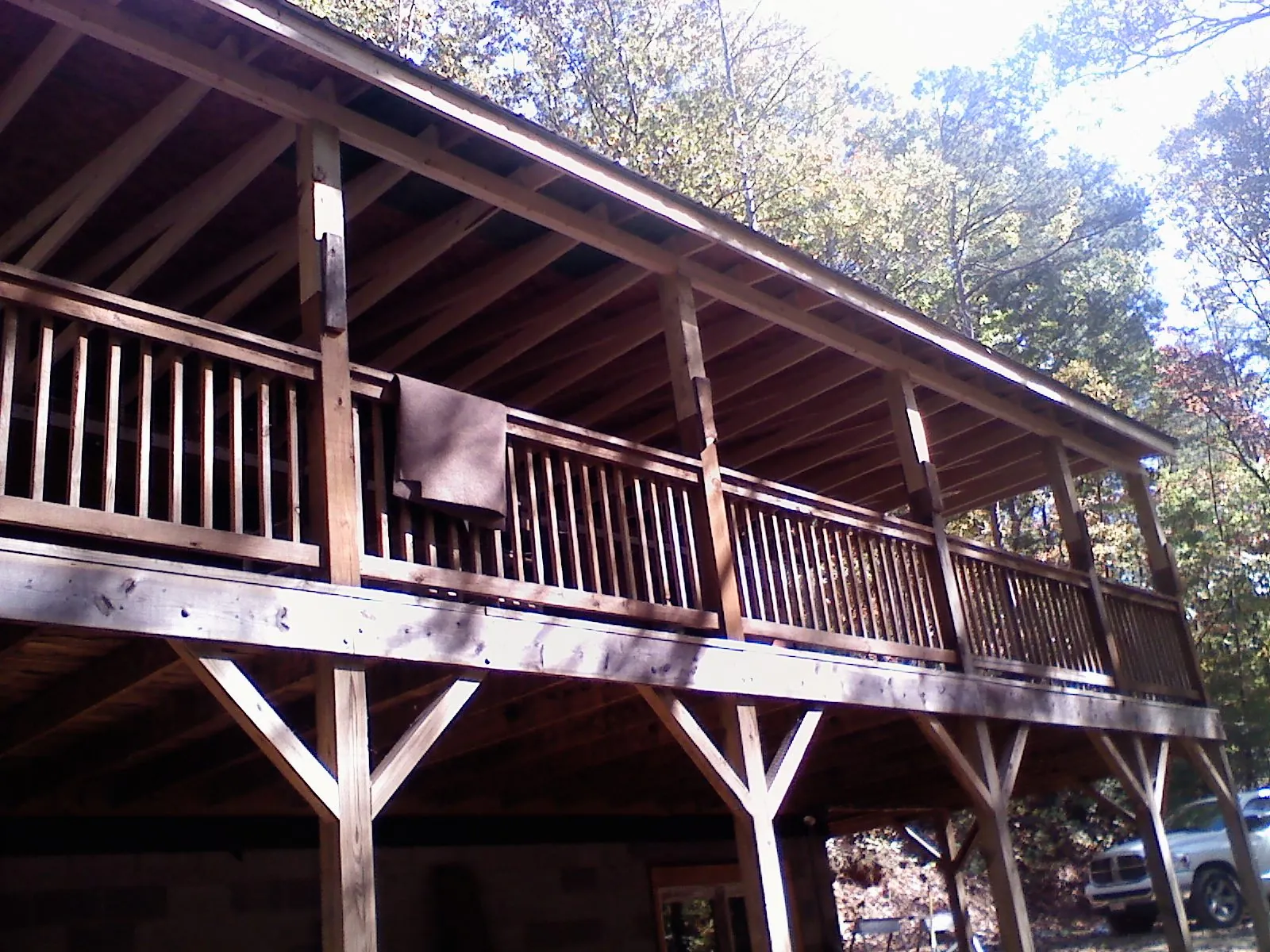 Timber framing under a new elevated porch and deck — Roof Leak Repair in Ionia by Roofing Brothers